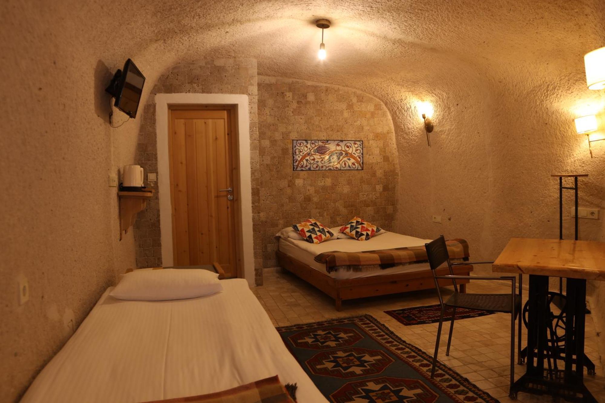 Pinhan Cave Suites Учгісар Екстер'єр фото